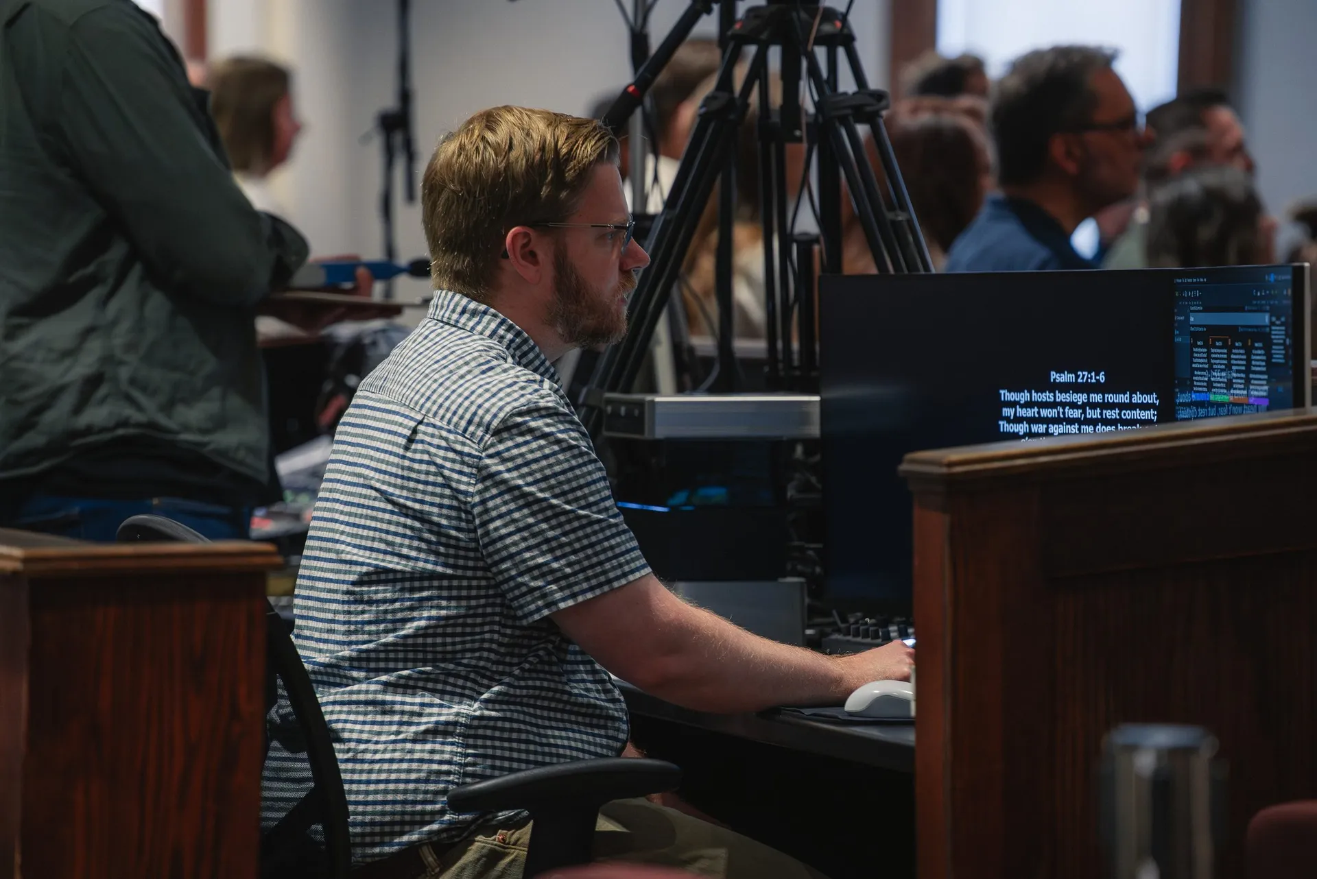 Volunteer serving on the AV team