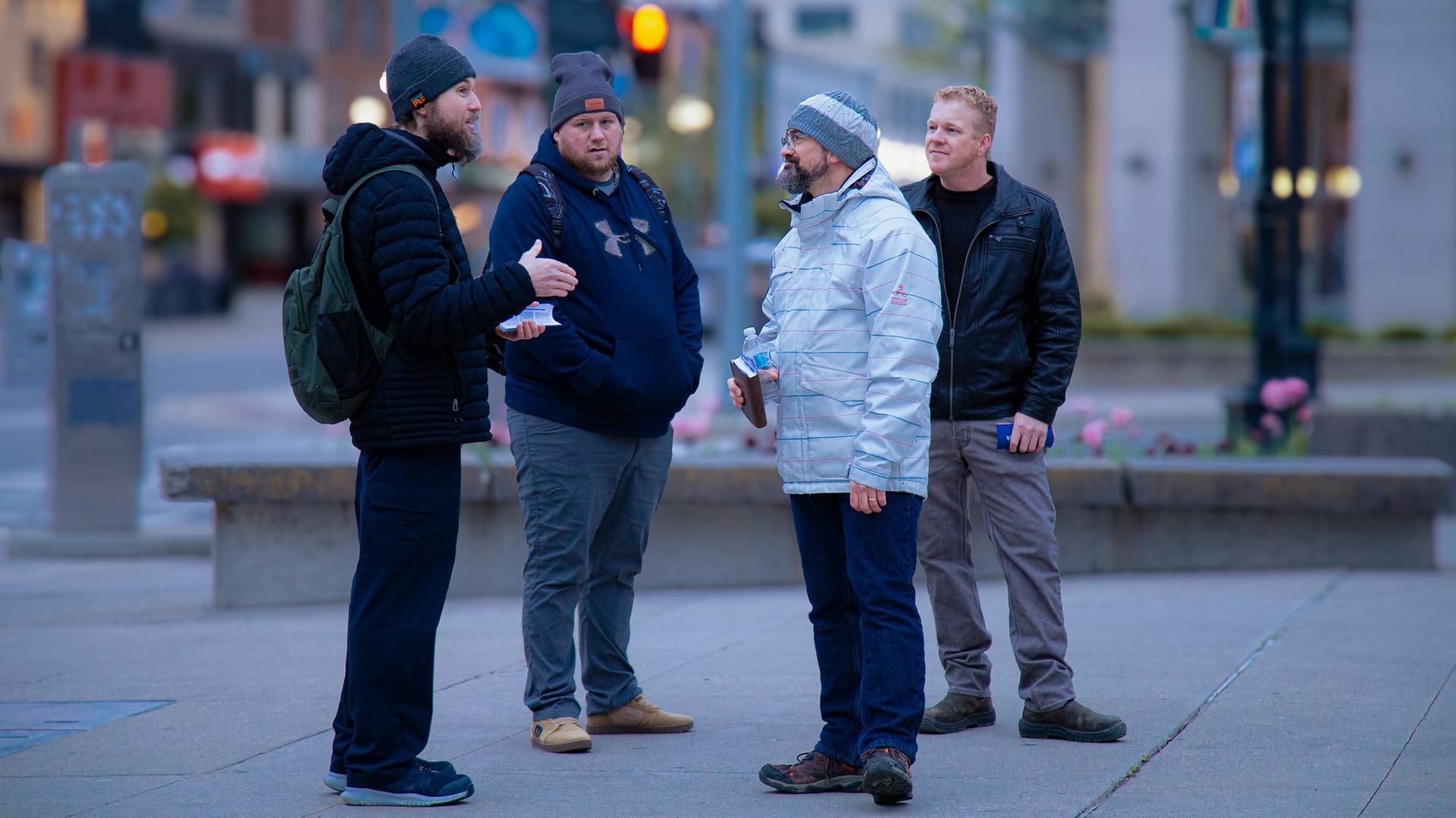 Members of the evangelism team in conversation downtown